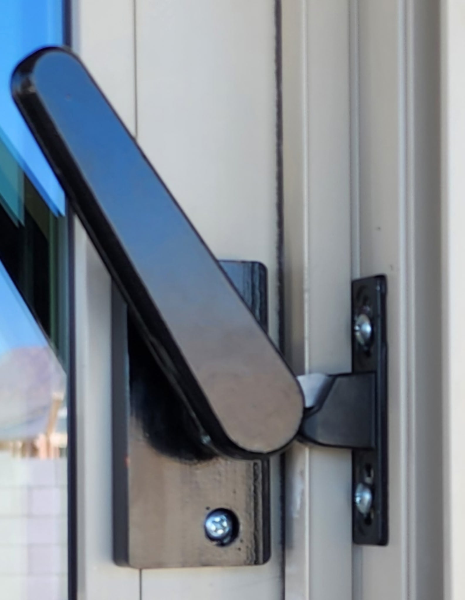 black door closer self latching